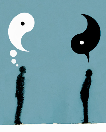Businessmen with yin and yang speech and thought bubbles overhead